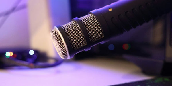 a close up of a microphone on a desk