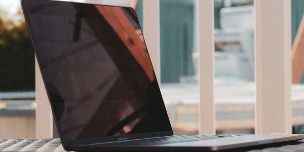 black laptop computer turned off