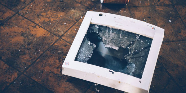 shattered monitor on the floor
